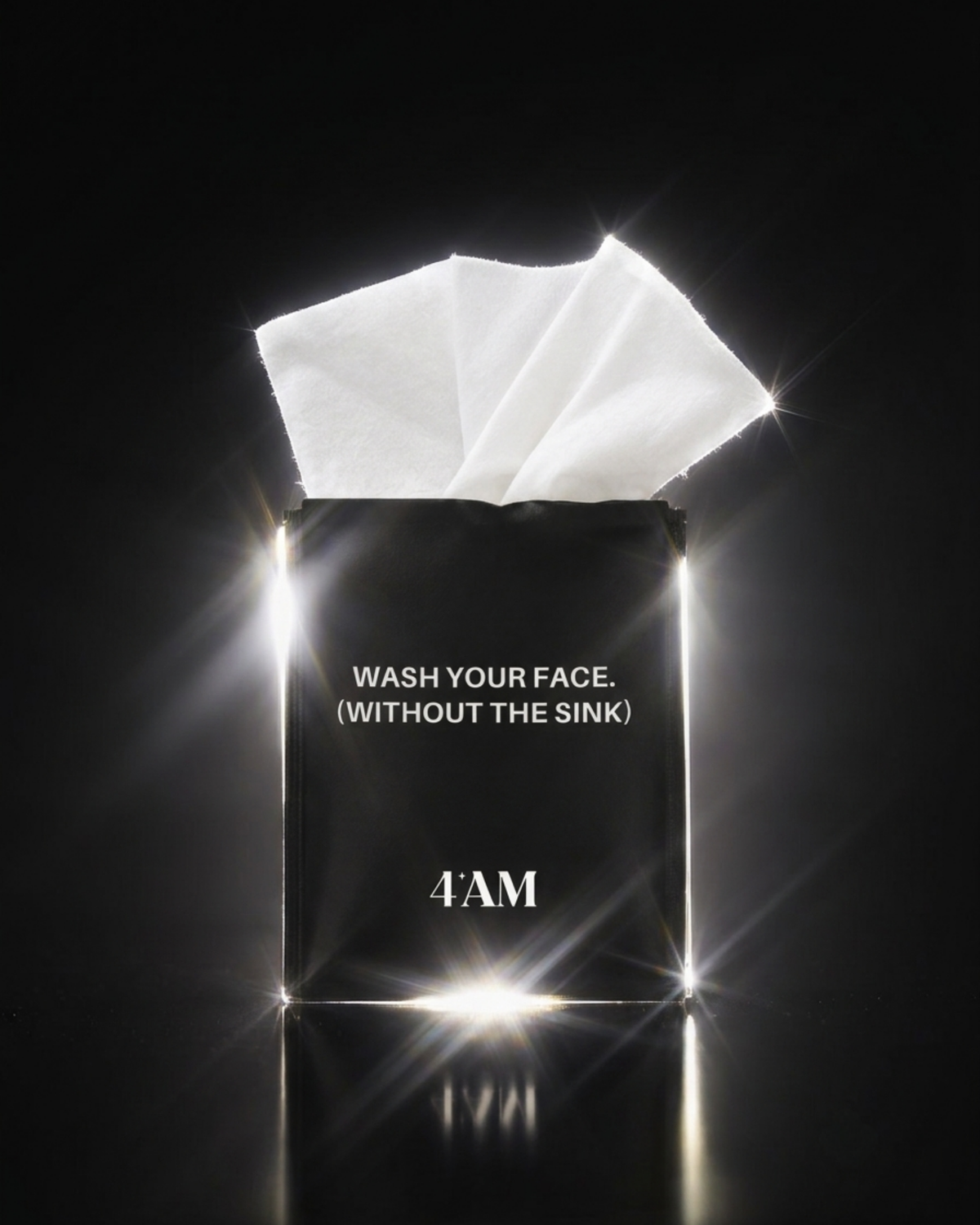 Open Clean Sheets packet printed Wash your face (without the sink), with the wipe showing, lit from behind